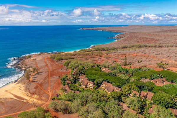 Island property surroundings feature tropical greenery and peaceful outdoor scenery