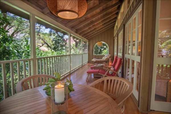 Unwind on the balcony with coffee, fresh air, and comfortable outdoor seating