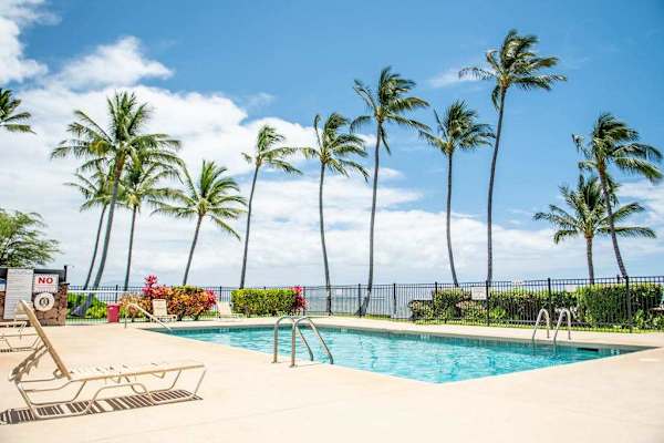 Refreshing swimming pool perfect for cooling off beneath warm sunny skies together