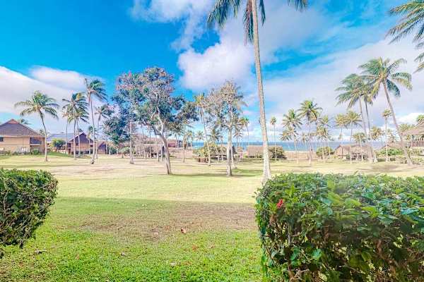 Lush resort greenery creates a peaceful setting for relaxing island escapes together