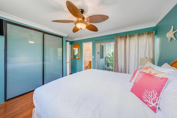 Bright and airy bedroom creates a comfortable retreat for relaxing throughout your vacation