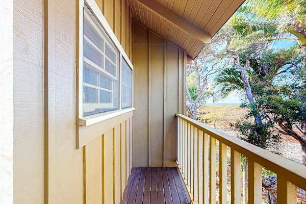 Balcony walkway offers tropical views and easy outdoor access