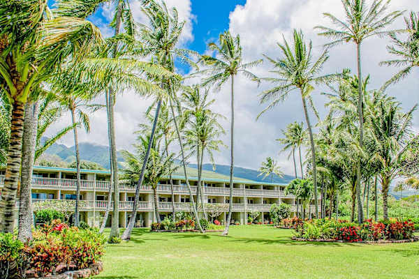 Experience a tranquil resort atmosphere with lush landscapes and welcoming outdoor spaces throughout