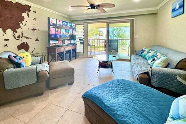 Stylish open living room creates a cheerful atmosphere filled with natural light and space