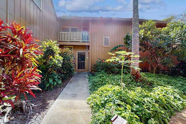 Guest-ready island residence offers bright spaces and convenient amenities