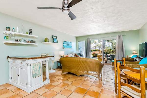 Kitchen island, dining table, and seating create a welcoming layout
