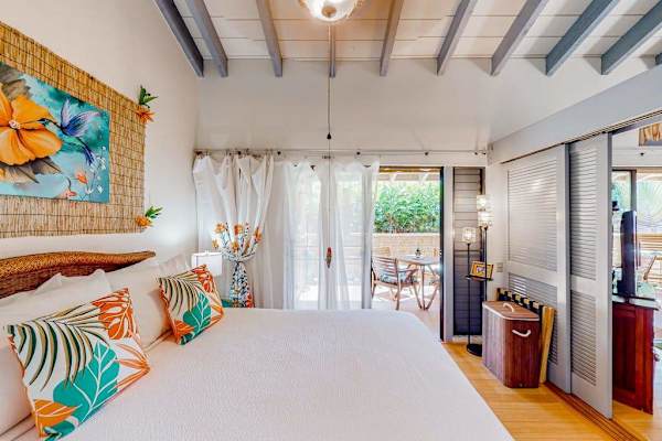 Peaceful bedroom captures island charm for restful evenings and refreshing vacation mornings