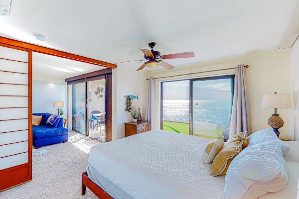 Master bedroom with a private lanai access for fabulous ocean views.