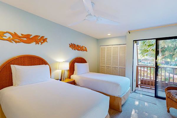 Rest easy in a comfortable bedroom with two beds
