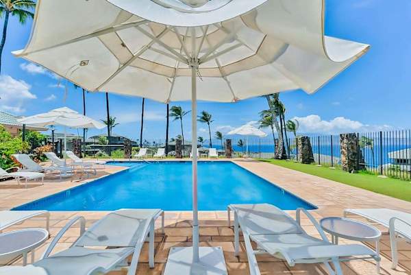 Oceanfront Infinity Pool Beneath Sunny Skies
