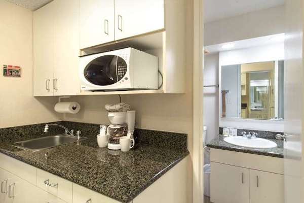 Start your mornings with ease at this convenient coffee station, ready whenever you need a fresh cup.