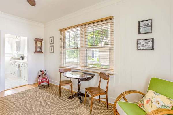 Enjoy cozy evenings and shared meals in this bright open-concept living area