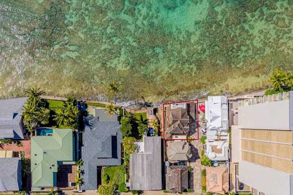 Aerial view showcases the home's inviting layout and peaceful surroundings beautifully together