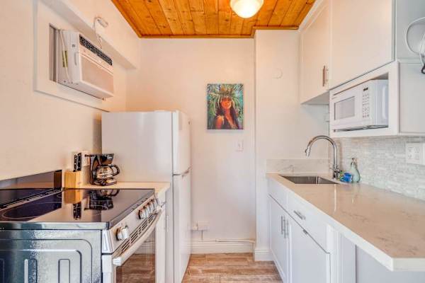 Cook, gather, and enjoy casual dining in this inviting kitchen space.