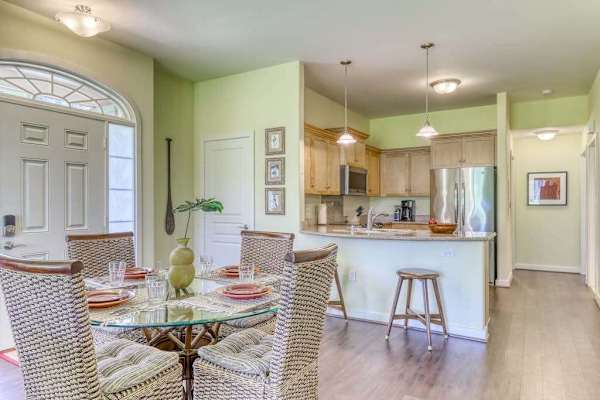 A versatile area where guests can prepare meals, enjoy conversations, and feel right at home.