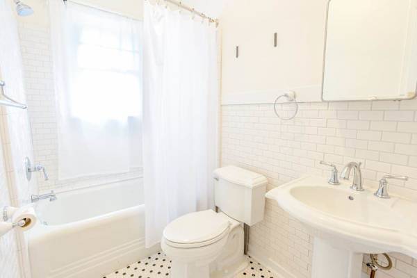 Refresh with a full bathroom featuring both tub and shower every day 