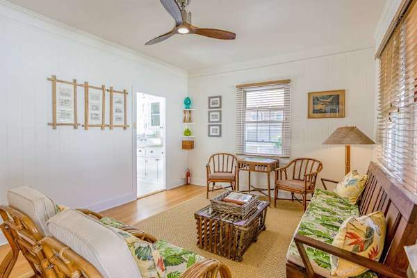 Unwind with comfortable seating in this charming cottage gathering space every evening