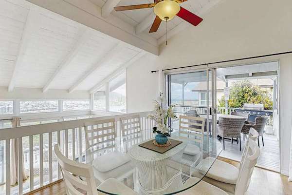 Share relaxed meals in this inviting dining area with overhead cooling.