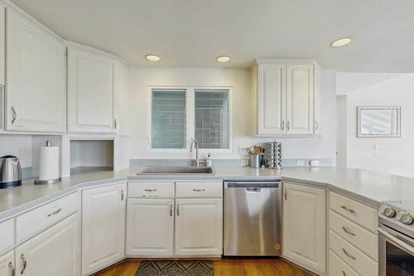 Prepare meals with ease in this fully equipped kitchen.