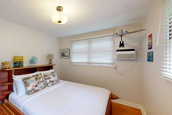 Queen size bed makes the third bedroom warm welcoming and wonderfully comfortable