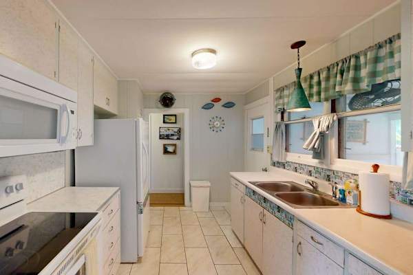 Create memorable family dinners inside this inviting fully equipped kitchen every evening