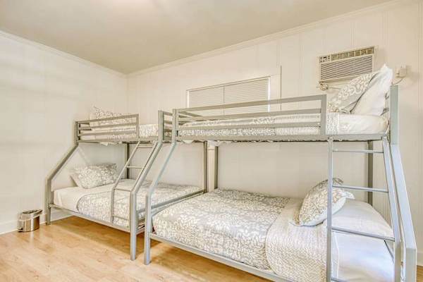 Second bedroom includes two twin over full bunks