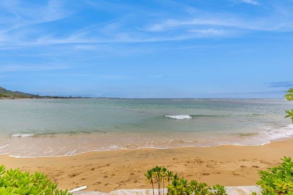 Sandy beach just steps from the backyard