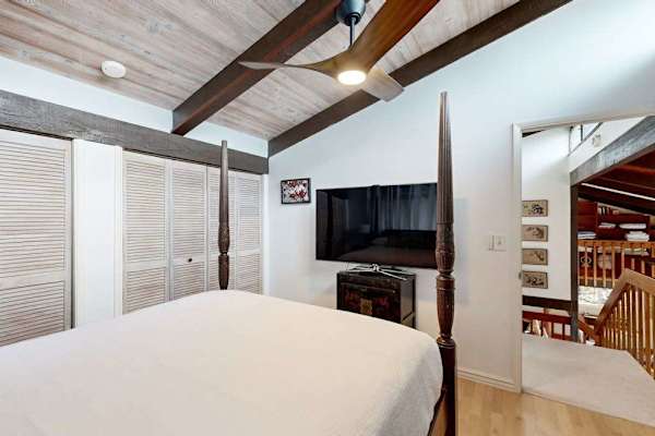 End the day comfortably in this inviting queen bedroom with a Smart TV.