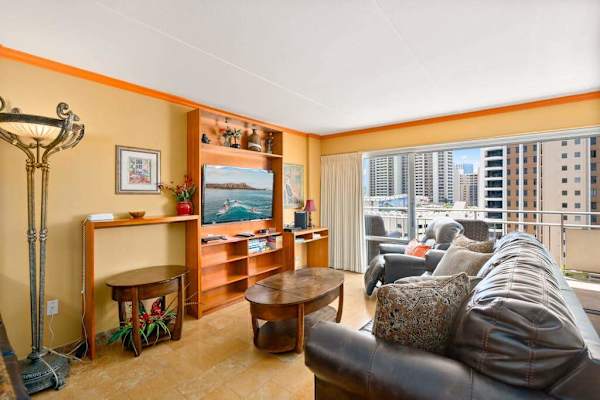 Warm wood accents create a welcoming living room for relaxing vacation moments together