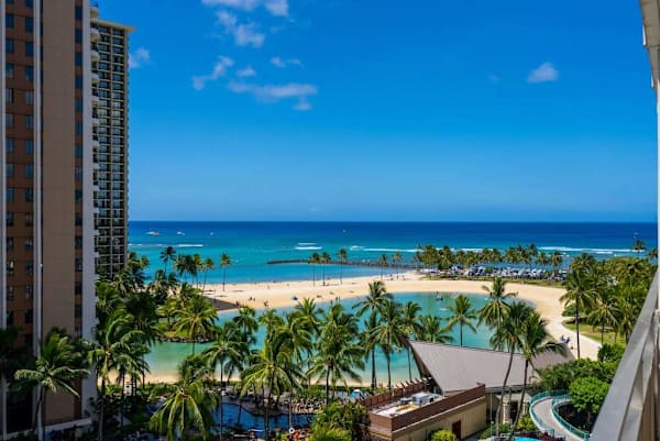Enjoy relaxing beach days at Hilton Hawaiian Village just moments from paradise