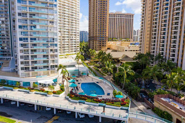 Bird's eye view showcases the inviting shared pool surrounded by tropical beauty