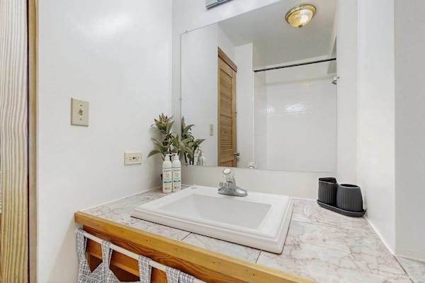 Keep your routine simple with convenient access to a full bathroom.