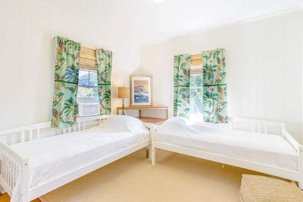 Relax and recharge in Cottage B's welcoming room with twin beds together