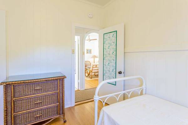 A cozy corner of bedroom three designed for restful nights and comfort