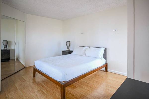 Enjoy peaceful nights in a cozy room with a comfortable queen-size bed.