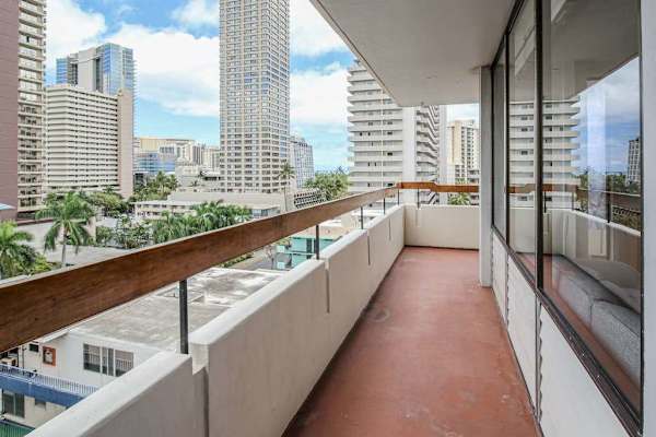 Unwind outdoors while overlooking the beautiful city skyline from the balcony.