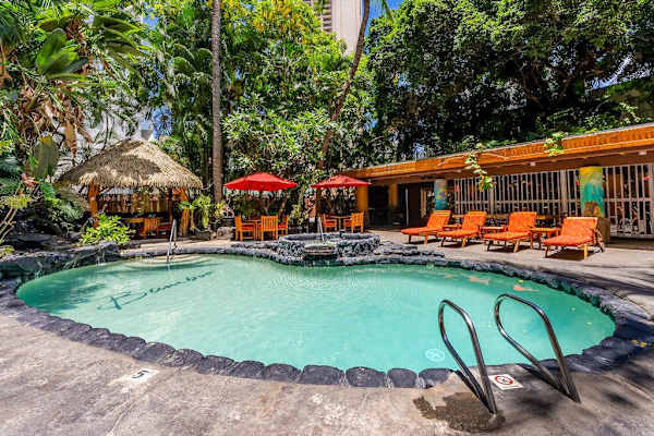 Take a dip or unwind beside the welcoming resort pool.