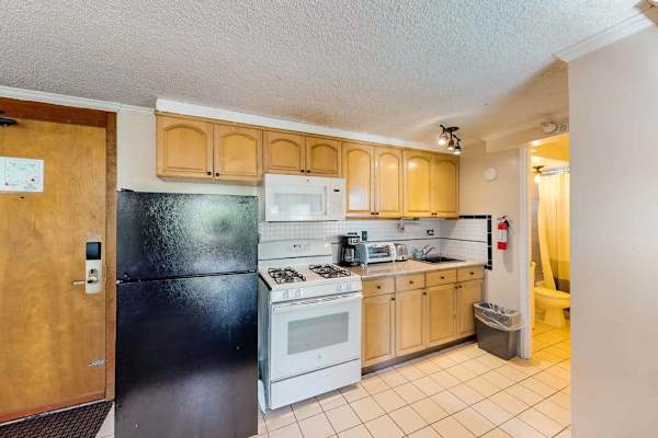 Enjoy the freedom to cook comfortably in this fully equipped kitchen.