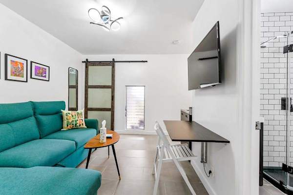 Comfortable studio sofa bed area for relaxing and restful nights