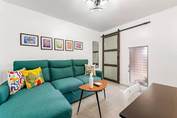 Cozy sofa provides a comfortable spot to unwind