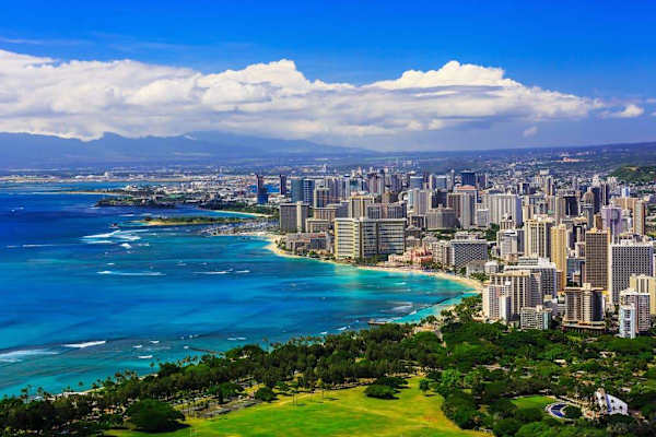 Wake up to breathtaking ocean views and the city's charm.