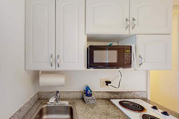 Compact kitchenette with convenient cooking essentials