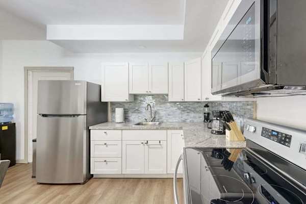 Prepare your favorite meals with ease in a fully equipped kitchen designed for your convenience.