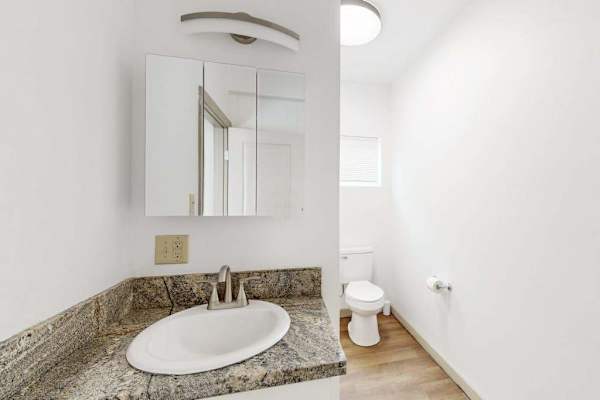 Refresh and recharge in a clean and comfortable full bathroom designed for your convenience.