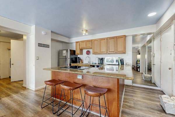 Prepare your favorite meals with ease in this complete kitchen area made for comfort and convenience.