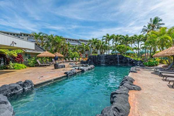 Resort pool with lounge chairs for sunny afternoons