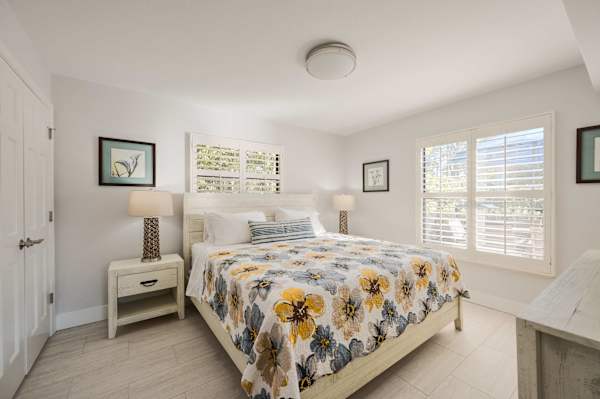 Beautiful Bedrooom with King size bed and natural light; Two nightstand and dresser
