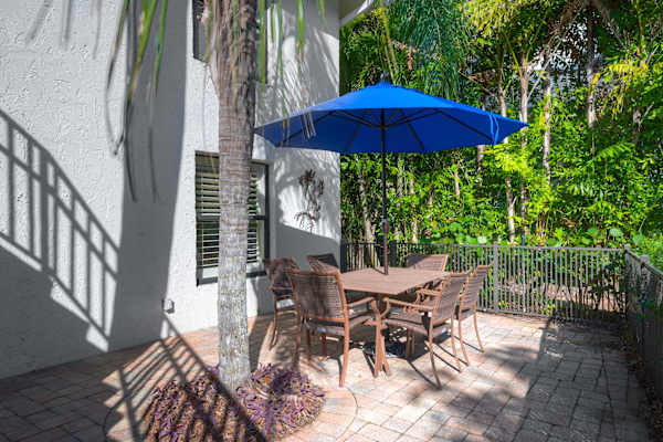 Sitting area with Umbrella; Perfect for Dining outside! 