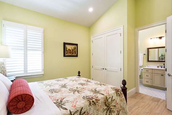 Bedroom Suite #2 with queen bed, with large closet and en-suite private bathroom.