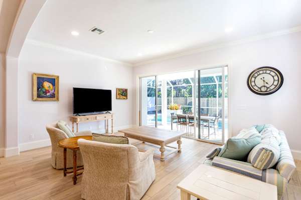 Cozy living room with entrance to the pool